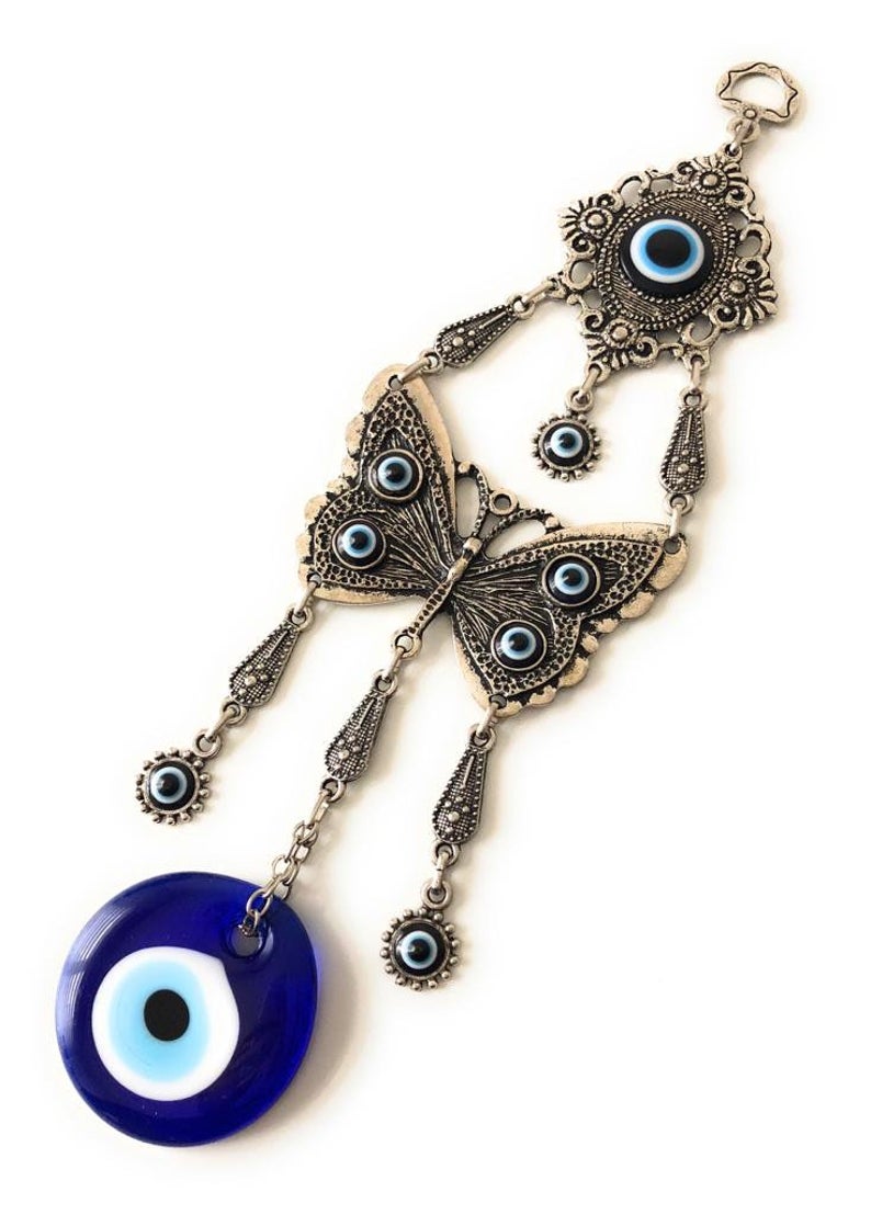 Butterfly wall hanging with evil eye beads