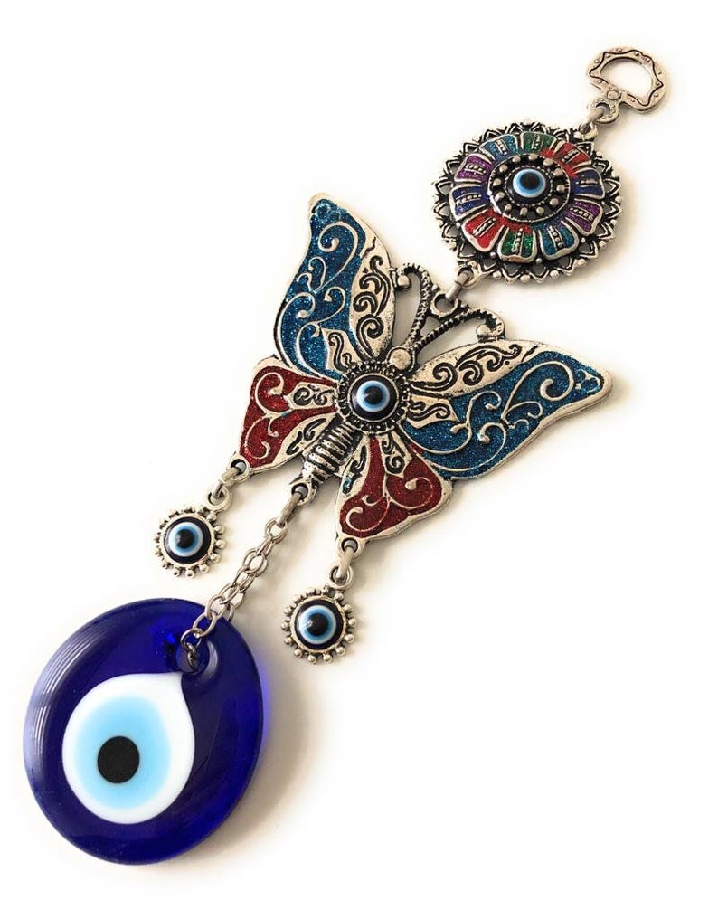 Butterfly wall hanging with evil eye beads